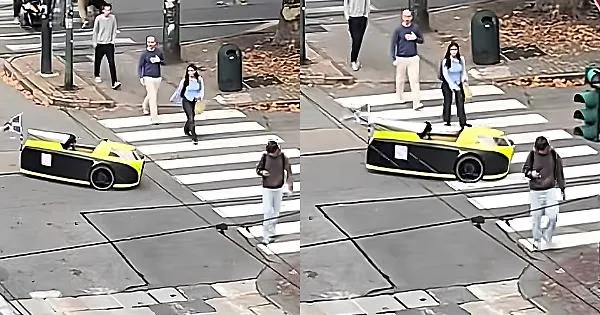Unidentified yellow and black vehicle filmed in Torino traffic